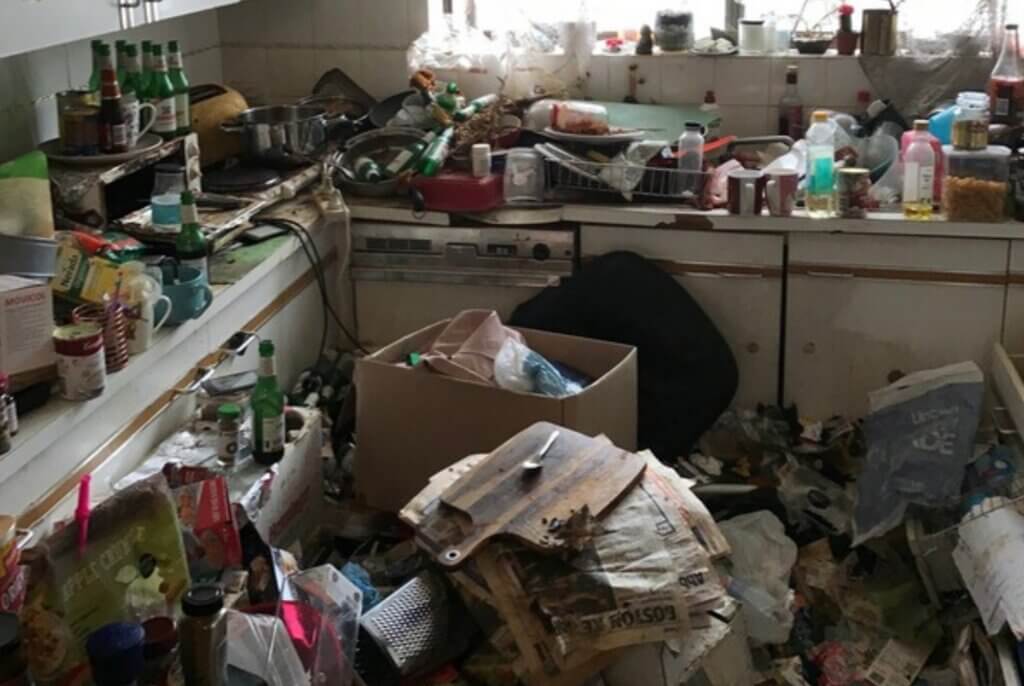 Hoarding cleaning of a severely hoarded Australian kitchen
